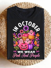 In October We Wear Pink And Purple Pumpkin Ghost Floral Graphic T‑Shirt, Fall Halloween Casual Short Sleeve Tee