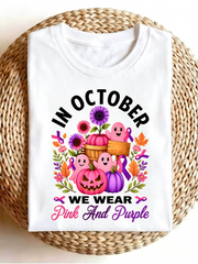 In October We Wear Pink And Purple Pumpkin Ghost Floral Graphic T‑Shirt, Fall Halloween Casual Short Sleeve Tee