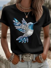 Short-sleeved T-shirt featuring a hummingbird print; regular fit with a crew neck; designed for women, suitable for spring and summer wear.