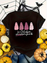 Halloween T-Shirt For Women Featuring A Design That Says 'In October We Wear Pink', Adorned With A Pink Ghost Motif black T-Shirt.