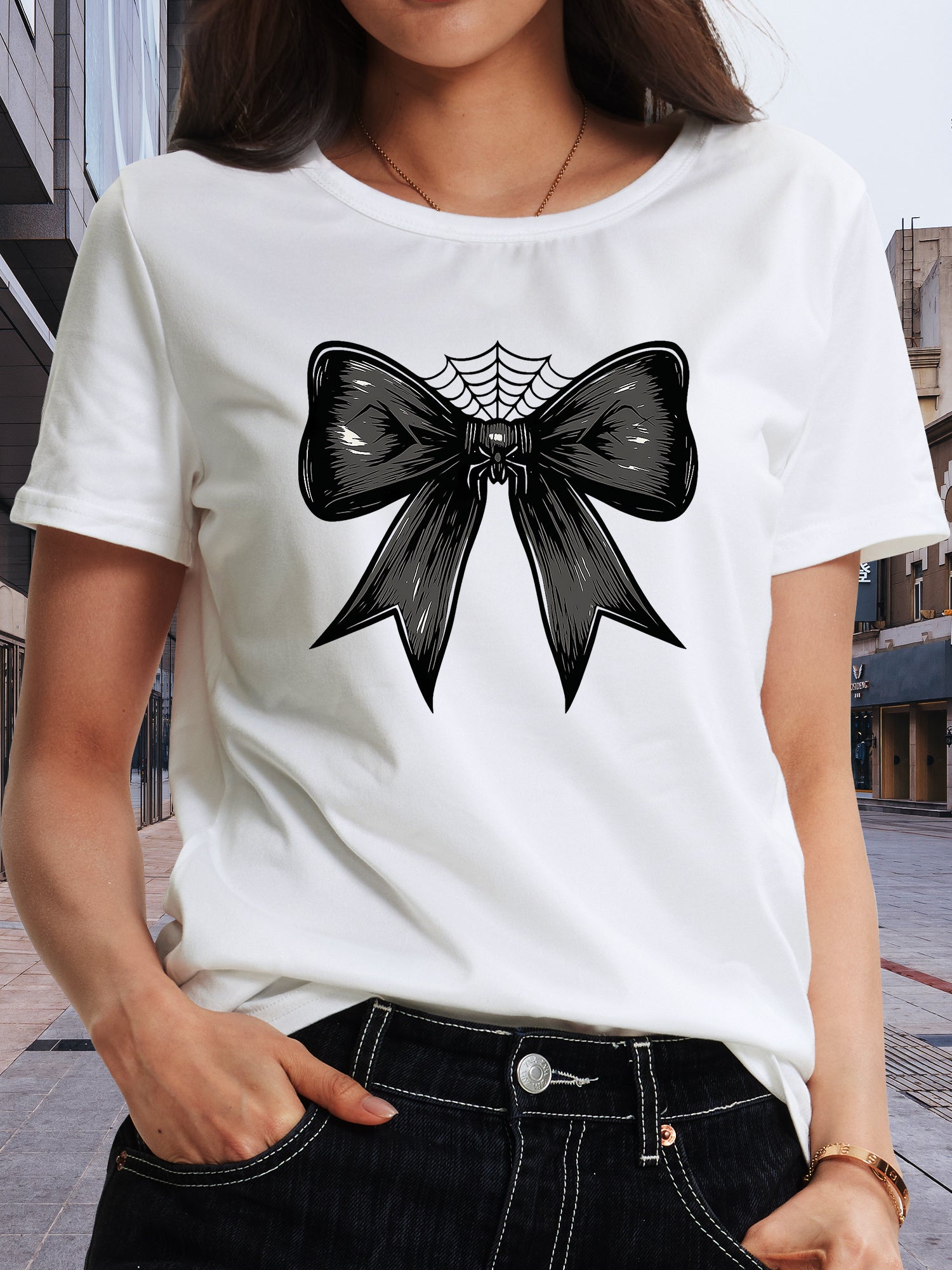 Halloween-themed bow print short-sleeve top
