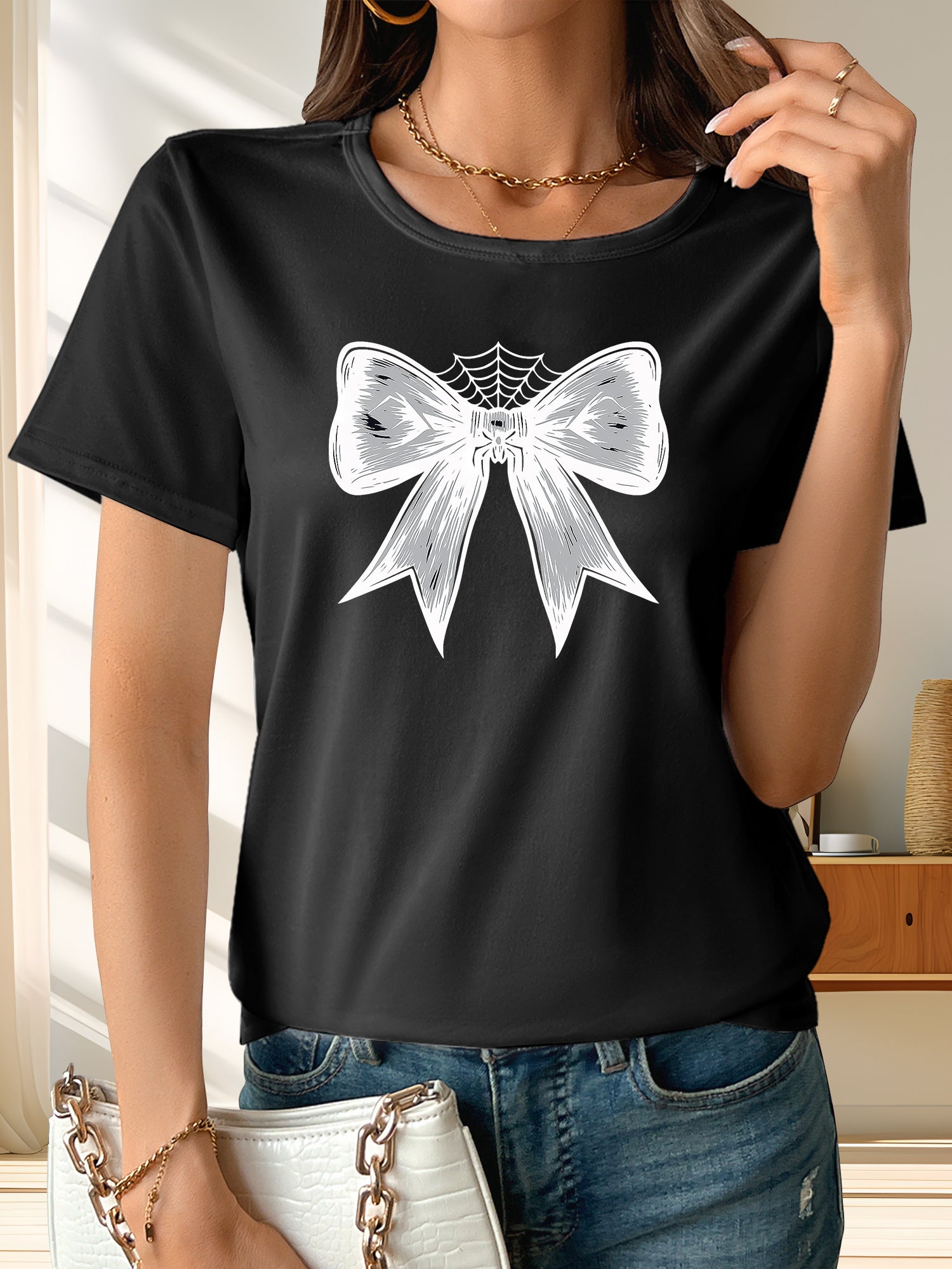 Halloween-themed bow print short-sleeve top