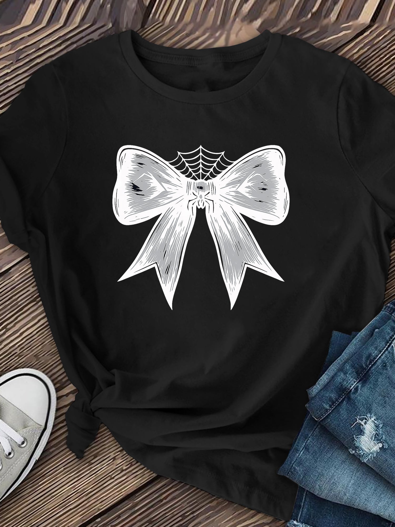 Halloween-themed bow print short-sleeve top
