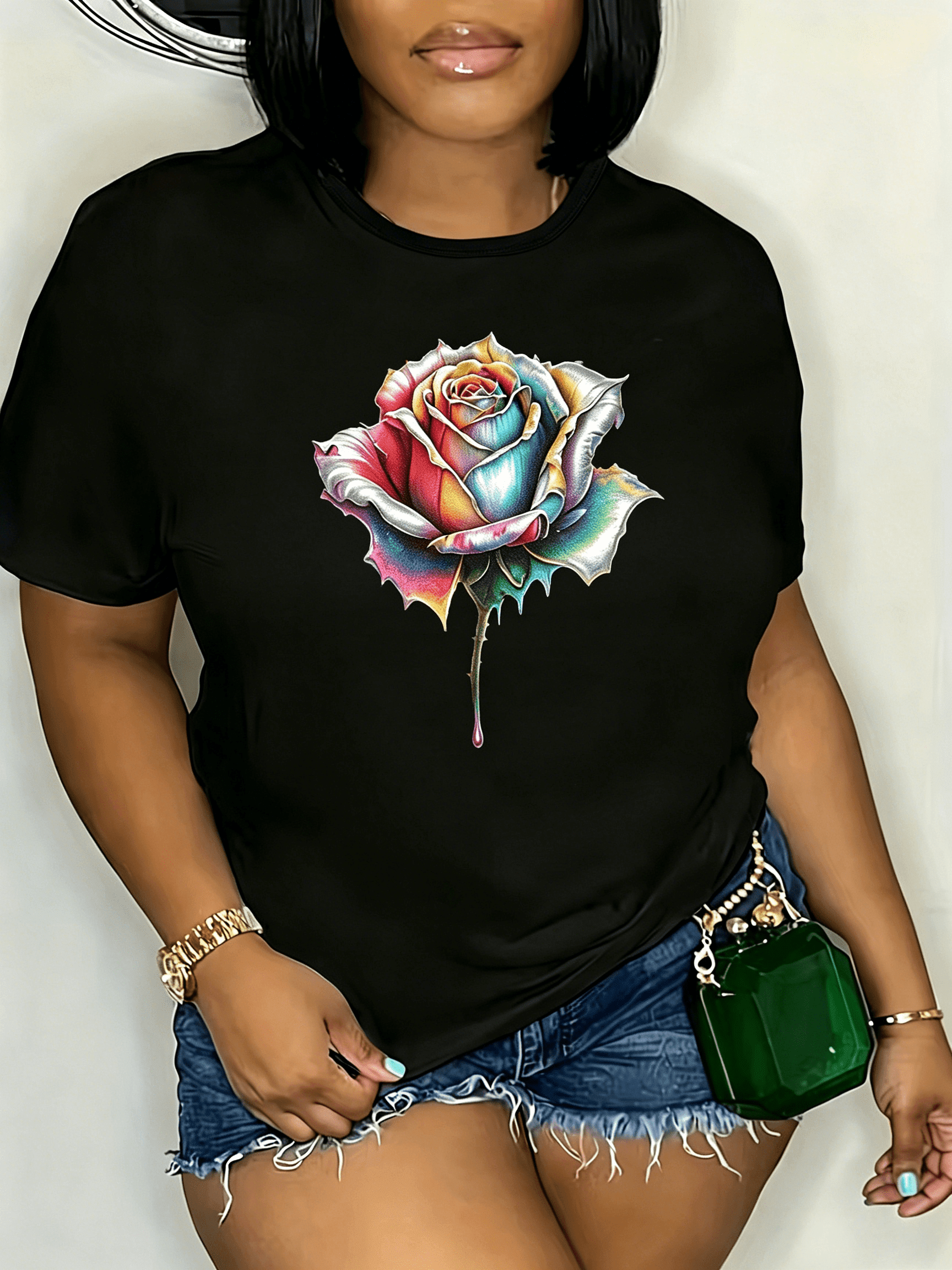 Women's casual short-sleeve T-shirt featuring a comfortable, everyday fit, breathable stretch fabric, a crew neck, and an artistic rose design.